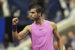 Sacré pour la 6e fois en Grand Chelem, Carlos Alcaraz déloge Jannik Sinner de la 1re place mondiale KEYSTONE/AP/Seth Wenig